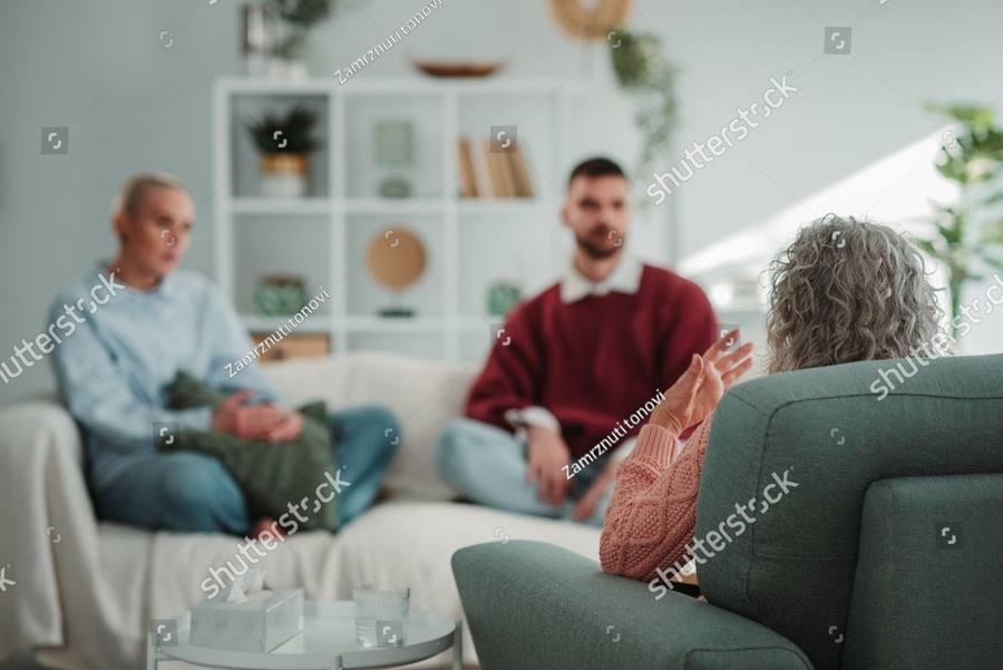 Couple talking with a therapist